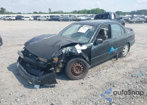 1997 Toyota Corolla Dx z USA, uszkodzony, nr VIN 1NXBB02E2VZ591343